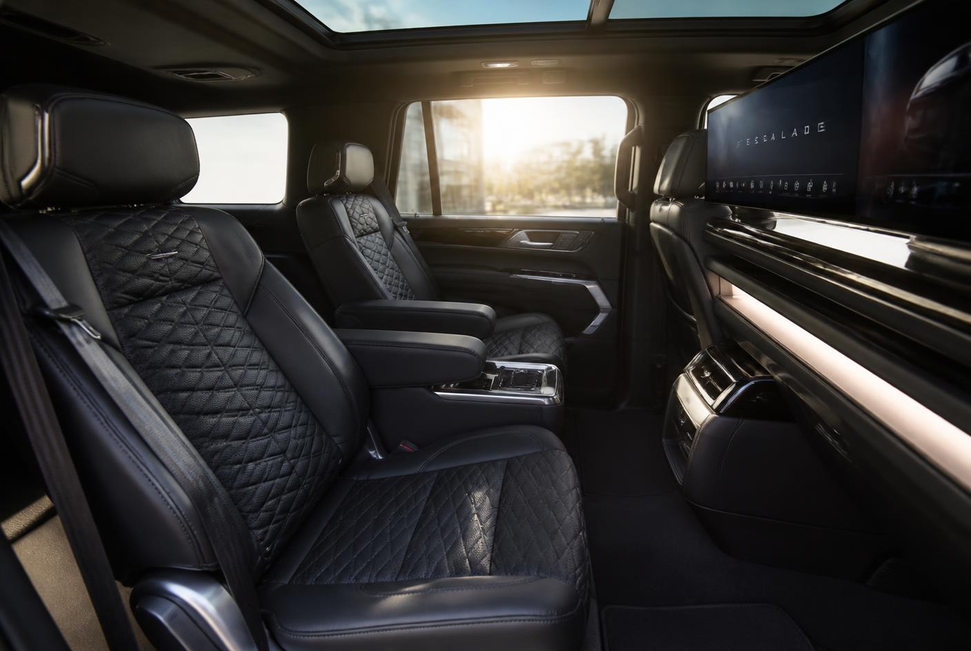 Interior of an MJS Express Luxury SUV with leather seating and ambient lighting
